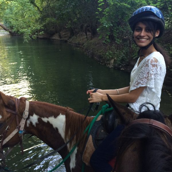 Horseback riding student hits the trail on beautiful paint mare named Annie Up